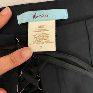 Black bell bottom slacks (pants)